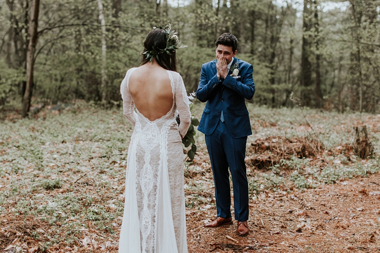 Groom crying seeing his bride for the first time